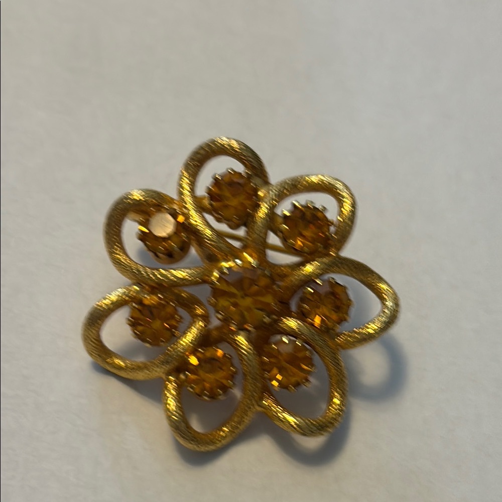 Elegant Gold Flower Brooch Topaz stones